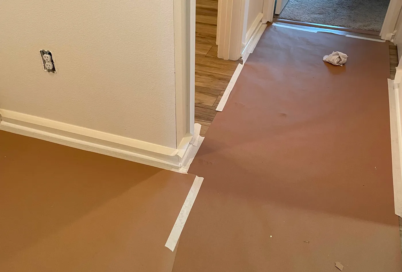Floor protection installed before interior painting