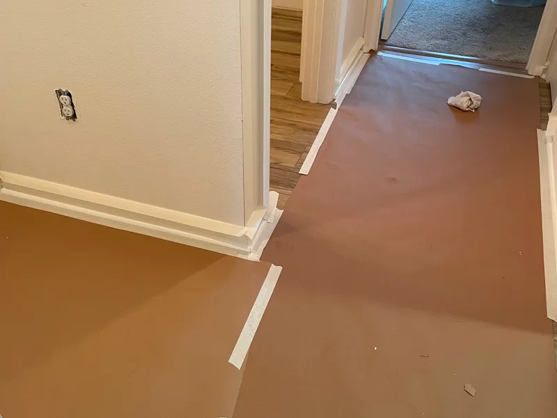 Floor protection installed before interior painting