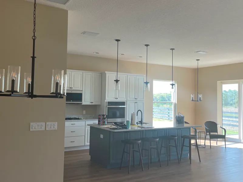 Kitchen island and cabinets with a smooth painted finish