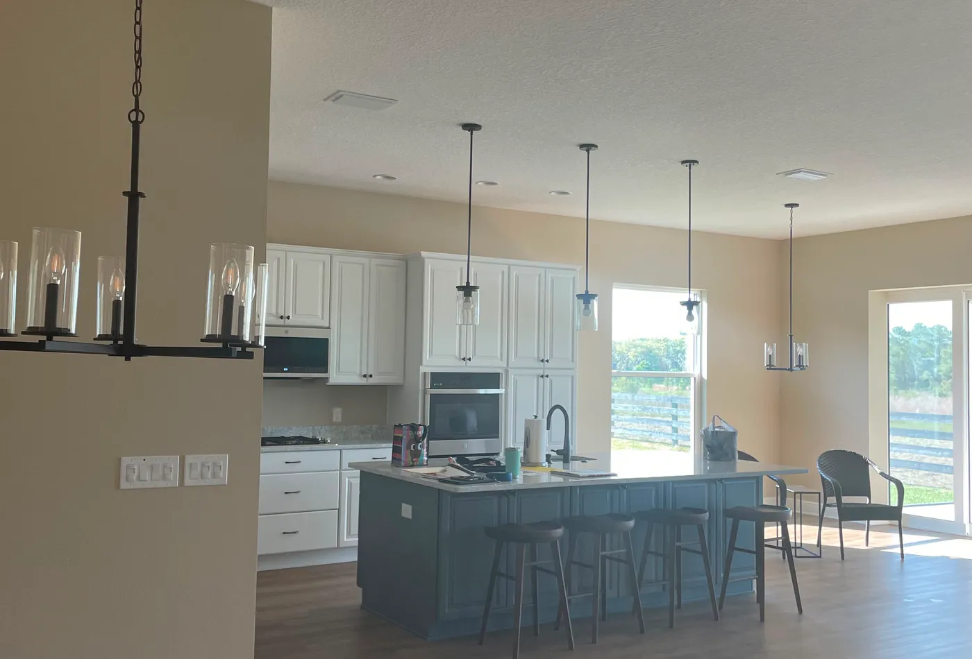 Kitchen island and cabinets with a smooth painted finish