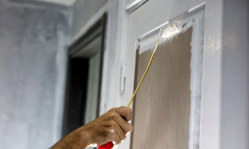 Freshly painted interior door and trim in a Hampton Roads home
