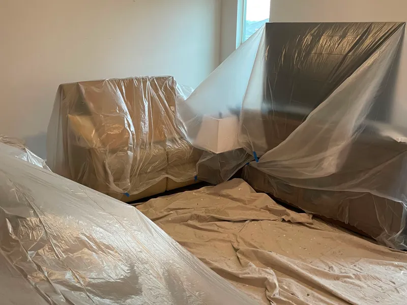 Furniture and room protection before interior painting