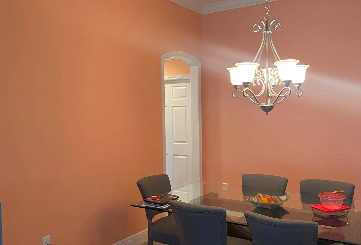 Orange dining room interior repaint with crisp wall finish