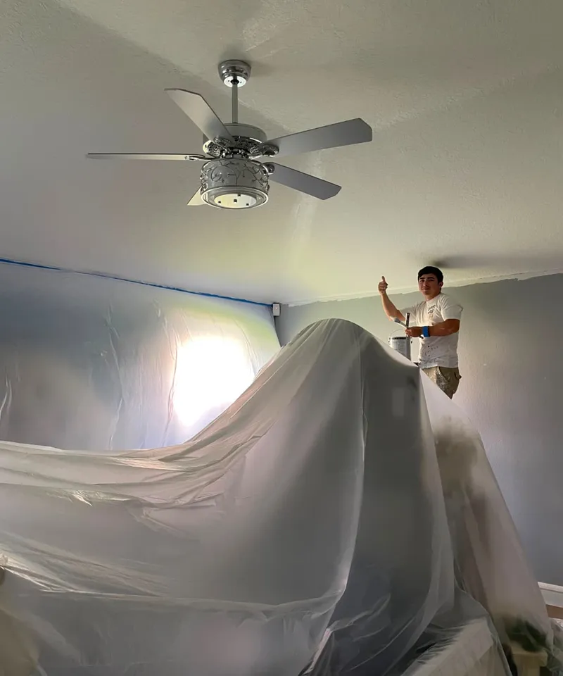Chris Quality Painting interior painting crew at work