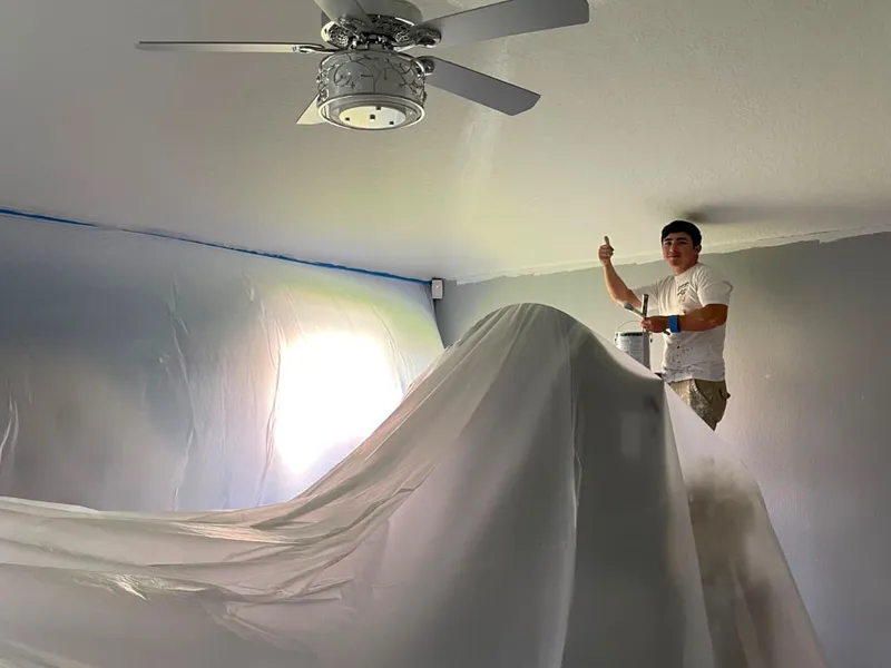 Interior painting crew working inside a Chesapeake home